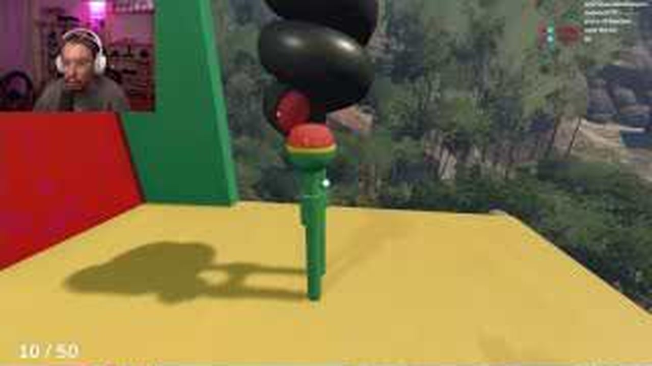 Tomato-shaped timer being placed in the final holder of the BIG WALK course